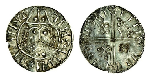 Hiberno-Norse, phase IV, 'scratched-die' coins, c.1060-65, Penny, 0.77g, bearded, helmeted bust facing, retrograde blundered legend, rev. blundered legned, voided long cross, symbols in angles (cf SCBI 8, 155-156; D.F. 27; S.6136) 