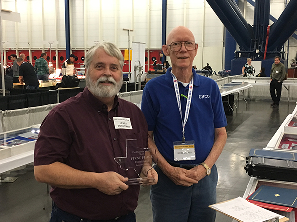 Jerry Fochtman (L) accepts an exhibit award from John Barber. Photo courtesy GHCC