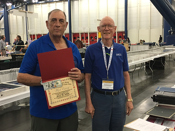 Rick Ewing (L) accepts Best in Show Award from Exhibit Chairman, John Barber.