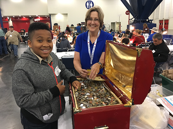 A youngster enjoys his opportunity at the Treasure Chest Grab. Photo courtesy GHCC
