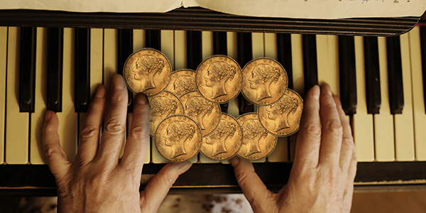 Gold Coins on Piano - News Wire