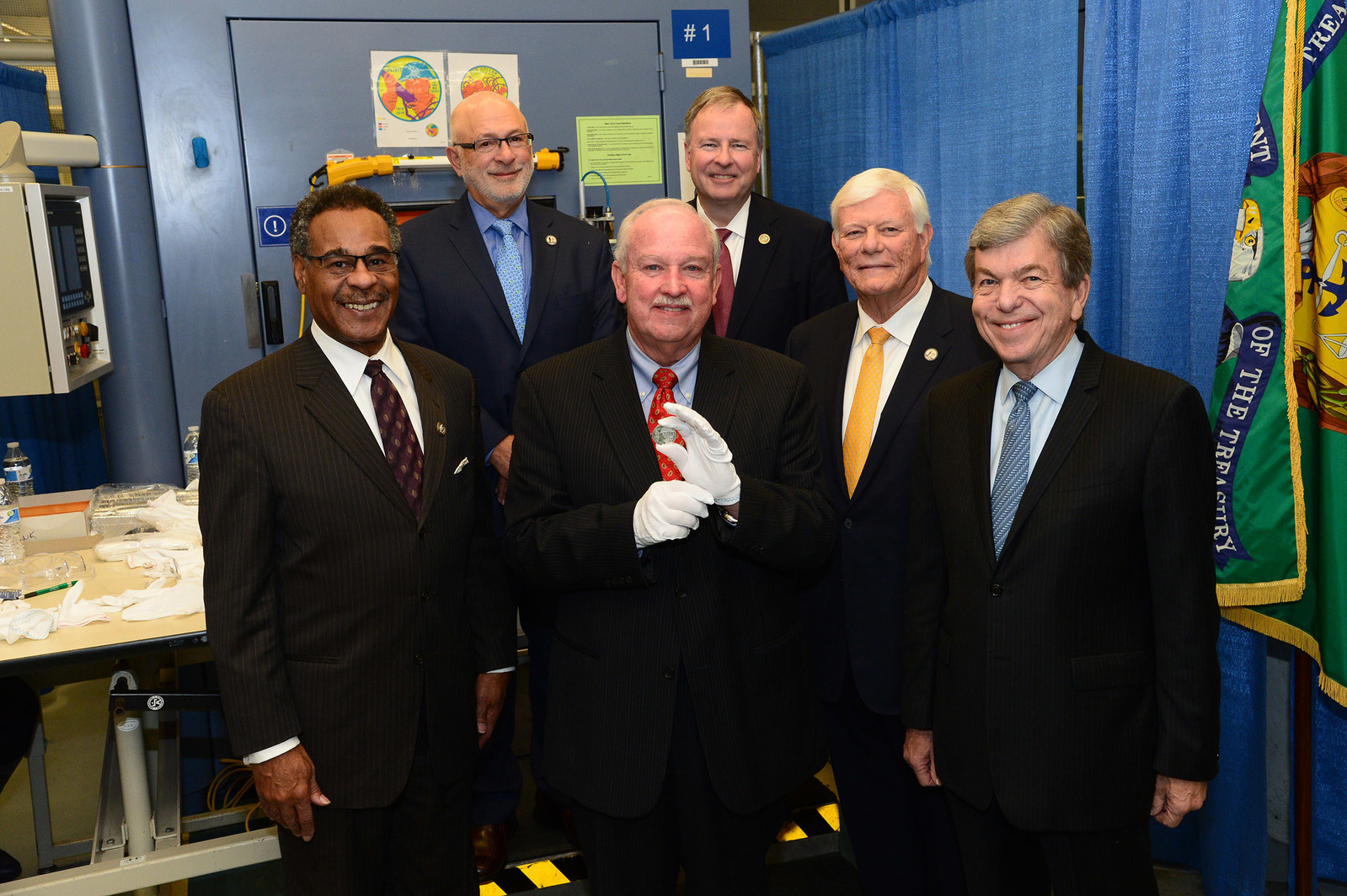 Gerald York, grandson of WWI hero SGT Alvin York, holds the U.S. Mint's newly-minted 2018 WWI Centennial Silver Dollar. He is joined by (l to r) Congressman Emanuel Cleaver, II (D-Missouri), Daniel Basta, U.S. Foundation for the Commemoration of the World Wars, Congressman Doug Lamborn (R-Colorado), U.S. WWI Centennial Commission Chair Terry Hamby and Senator Roy Blunt (R-Missouri). The new commemorative coin was authorized by Congress, through bipartisan legislation. The coin, available to the public in January 2018 via www.usmint.gov, honors America's WWI veterans during the centennial period of the war, and a surcharge will support work of the Foundation. (PRNewsfoto/U.S. World War One Centennial...)