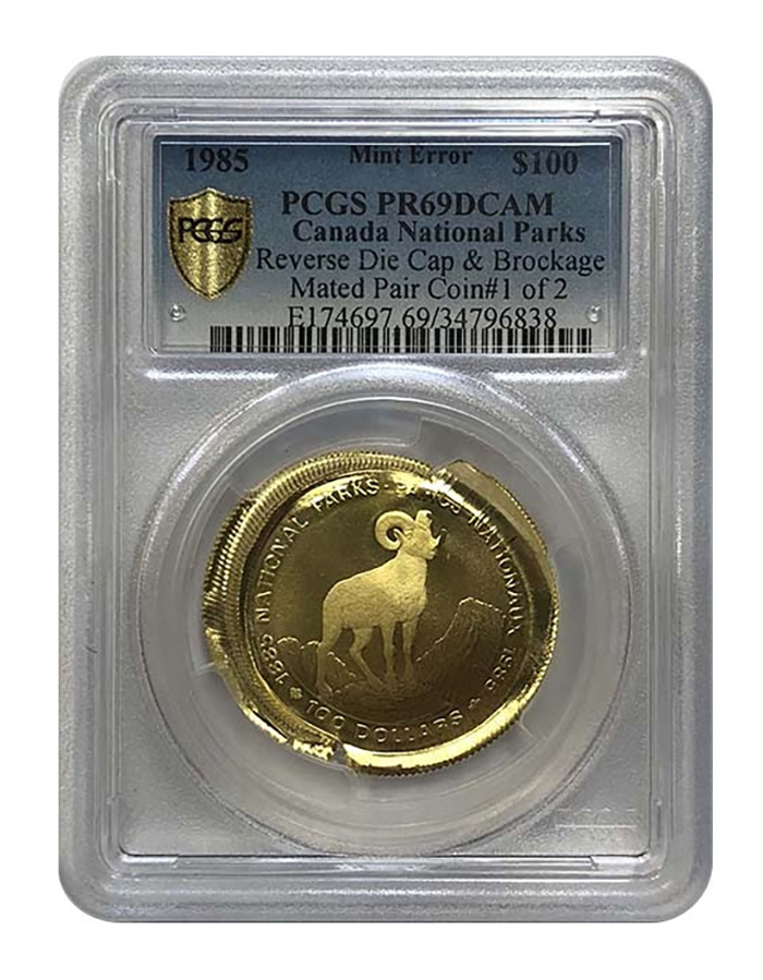 This proof gold reverse die cap (Coin #1) is more than 30% larger in diameter than a properly struck commemorative.