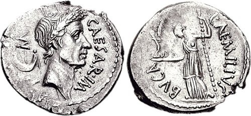 AR Denarius.  Obverse: Laureate head of Julius Caesar right.