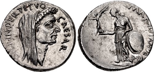 AR Denarius.  Obverse: Wreathed and veiled head of Julius Caesar right, CAESAR  downward in front,