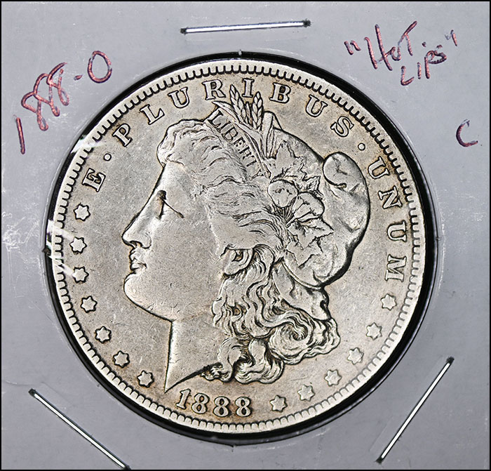 1888-O VAM-4 "Hot Lips" Morgan dollar. Very fine details, but cleaned.
