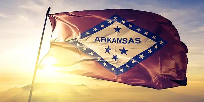 Arkansas Removes Taxes on Gold and Silver; The Arkansas State Flag. Image: Adobe Stock.