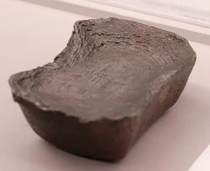 A 50 taels grain tax silver ingot, or sycee, from 1629 – near the end of the Ming Dynasty. This is similar to ones recovered from the Minjiang River. Courtesy of Peter Anthony.