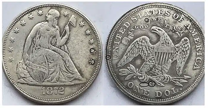 Counterfeit 1872 Liberty Seated One Dollar coin. Note the placement of the CC mintmark. Image: Jack Young.