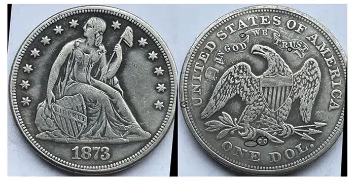 Counterfeit 1873-CC Liberty Seated dollar. Image: eBay.