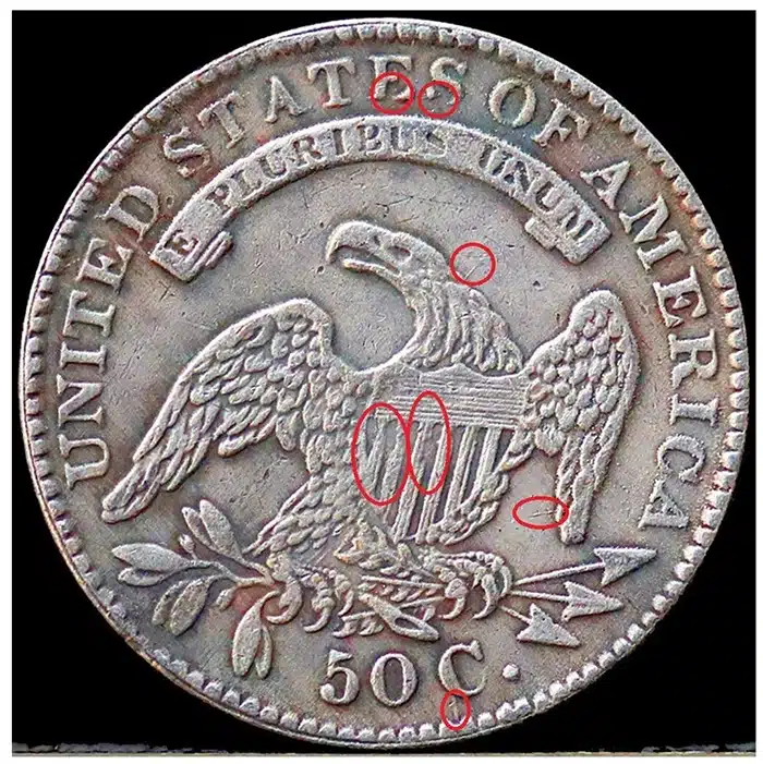 Common Counterfeit Reverse; matching attribution marks in red.