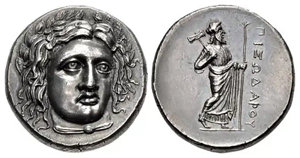 Figure 5: Halikarnassos, CARIA. Pixodaros. Circa 341/0-336/5 BCE. AR Tetradrachm. Halikarnassos mint. Struck circa 341/0 BCE. Head of Apollo facing slightly right, wearing laurel wreath, drapery at neck / Zeus Labraundos standing right; ΠIΞOΔAPOY to right, 24mm, 15.25 g., Pixodaros 7–8 (unlisted dies) (this coin). (Triton XXIV, Lot: 717, $90,000, 1/20/21).
