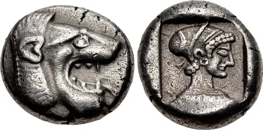Figure 7: Knidos, CARIA. Circa 500-490 BCE. AR Drachm. Head of lion roaring right / Head of archaic Aphrodite right, wearing stephanos and with hair in sakkos within incuse square, 16.5mm, 6.13 g., SNG Copenhagen 202. (CNG 102, Lot: 510, $1200, 5/18/16).