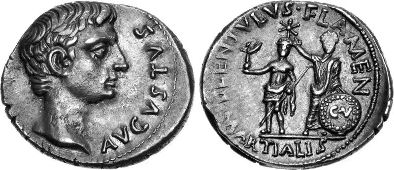 Figure 7: Augustus, 27 BCE - 14 CE. AR Denarius. Rome mint: L. Lentulus. moneyer. Struck 12 BCE. AVGVSTVS. Bare head right / L • LENIVLVS • FLAMEN MARTIALIS, statue of Agrippa(?) on left, holding Victory in right hand and spear in left, being crowned with star by Augustus standing facing to right, holding in left hand around shield inscribed C • V set on ground, 3.06 g., RIC 1 415. (Triton XVII, Lot: 635, #3500, 1/6/14).