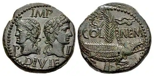 Figure 10; Augustus, with Agrippa, GAUL, Nemausus, 27 BCE - 14 CE. AE As. Struck circa AD 10-14. Heads of Agrippa, wearing combined rostral crown and laurel wreath, and Augustus, laureate, back-to-back, IMP P-P DIVI F / COL NEM across field, croco- dile right, chained to palm frond: at top, wreath with long ties; two palm fronds at base, 26mm, 12.89 g., RIC I 159. (CNG 114, Lot: 498, $2750, 5/13/20).