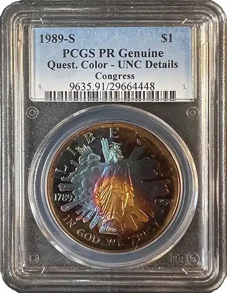 1989-S Congress Commemorative Dollar with toning that has been determined to be artificial by PCGS. Image: CoinWeek.