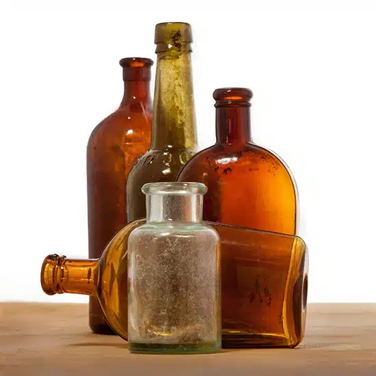 Antique bottles. Image: Adobe Stock.