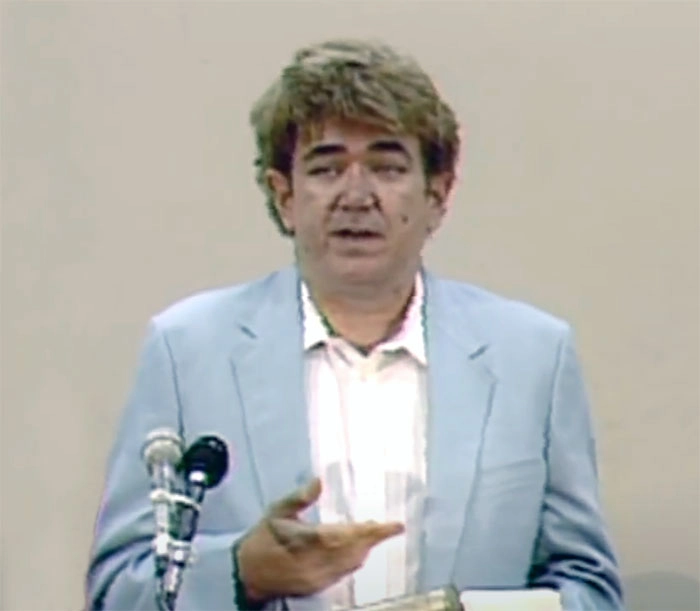 Bruce Amspacher gives a presentation on silver dollar investing in 1988. Image: CoinWeek.