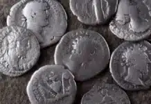 A group of circulated ancient coins. Image: Adobe Stock.