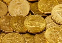 This is a photograph of a pile of United States generic gold coins.