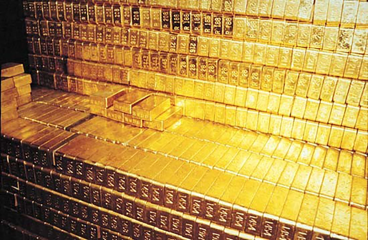 Figure 3. Gold bars stacked at the Fort Knox Bullion Depository. These are older rectangular bars case before adoption oftrapezoidal “good delivery” bar shapes. (Photo courtesy Treasury Department.)