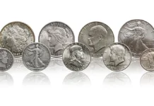Raw Coins: Silver dollars and silver half dollar coins. Image: Adobe Stock.
