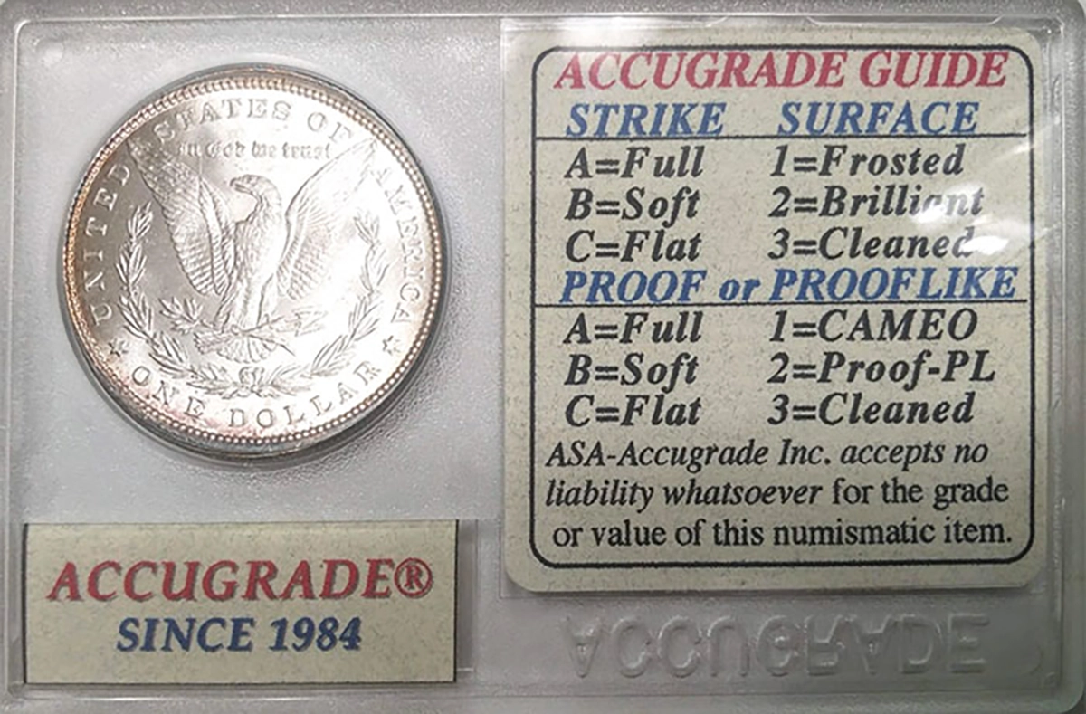 Early coin holder from the defunct ASA Accugrade company denotes a number of coin designations.