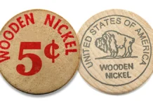 Two wooden nickels. Image: Adobe Stock.