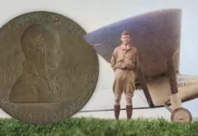 Charles Lindbergh stands next to The Spirit of St. Louis. To the left: A bronze galvano of the obverse of the Lindbergh Congressional Gold Medal. Image: Byers / Adobe Stock / CoinWeek.