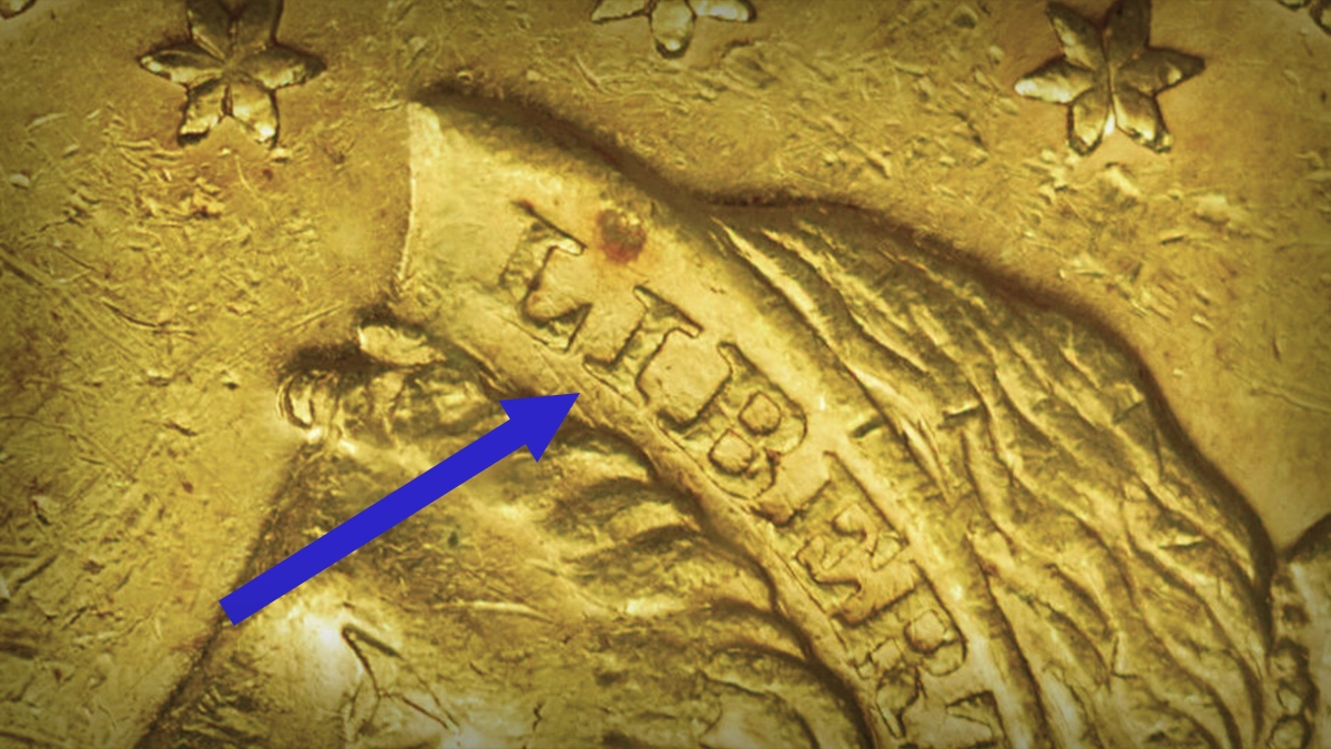 Die line present under LI. Diagnostic of a business strike. Image: Heritage Auctions / CoinWeek.