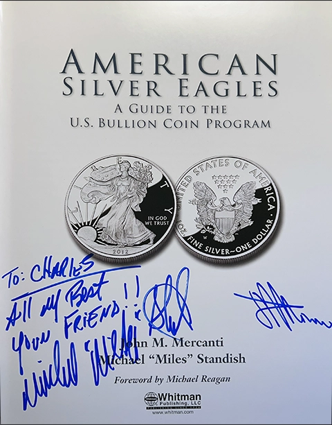 American Silver Eagle book, signed.