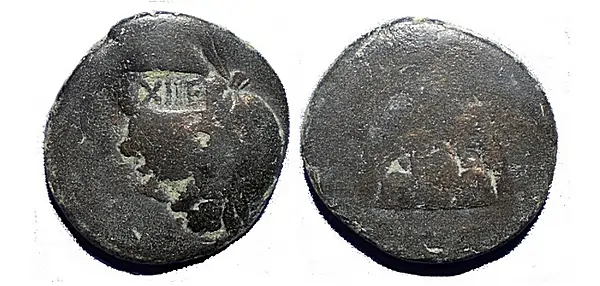 A worn bronze coin of Hadrian (117-138 AD) Countermarked “XIIF” by Legion XII Fulmanata Circa 150 AD (GIC 738) Image by the author