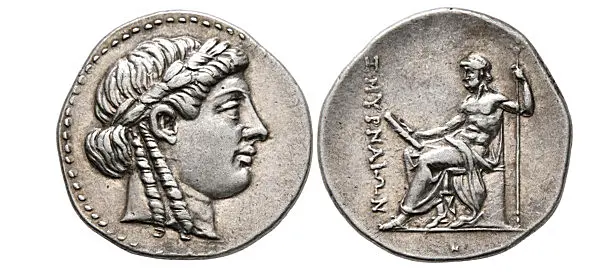 IONIA. Smyrna. Circa 190-180 BC. Drachm (Silver, 20 mm, 4.19 g, ),. Laureate head of Apollo to right, with two locks of hair falling down his neck. Rev. ΣΜΥΡΝΑΙΩΝ The Poet Homer seated left, holding scroll in his right hand and scepter in his left. BM 1920,1122.1. Of the highest rarity, arguably the finest of a very few known examples. A wonderful coin of magnificent full Hellenistic style, with an exceptional rendering of the most famous ancient poet on the reverse. 