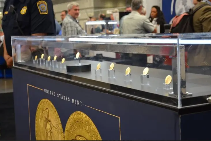 The 11 government-owned 1933 Saint-Gaudens double eagles displayed for show attendees at the U.S. Mint booth on Friday.